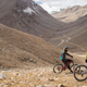 Illustration for article titled How To Make The Worlds Highest Road More Extreme: Mountain Bike It
